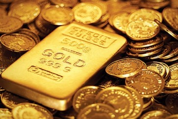 الذهب يصعد مع تراجع الدولار قبيل قرار المركزي الأمريكي