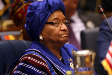 Liberian President Ellen Johnson Sirleaf attends an Arab and African leaders summit meeting in Kuwait city on November 19, 2013. The summit aims at reviewing steps to promote economic ties between wealthy Gulf states and investment-thirsty Africa. AFP PHOTO/YASSER AL-ZAYYAT        (Photo credit should read YASSER AL-ZAYYAT/AFP/Getty Images)