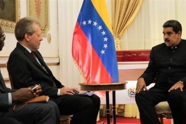 منسق الأمم المتحدة في فنزويلا بيتر غروهمان، والرئيس الفنزويلي نيكولاس مادورو