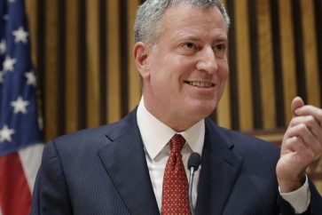 New York City Mayor Bill de Blasio speaks during a news conference at police headquarters in New York, Monday, Dec. 22, 2014. De Blasio called Monday for a pause in protests over police conduct as he faced a widening rift with those in a grieving force who accuse him of creating a climate of mistrust that contributed to the execution of two officers. (AP Photo/Seth Wenig)