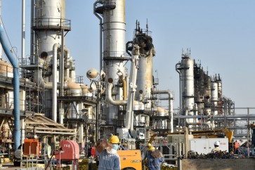 (FILES) This file photo taken on September 20, 2019 shows employees of Aramco oil company working in Saudi Arabia's Abqaiq oil processing plant. - Saudi Aramco shares hit the lowest level since their market debut today, as Gulf bourses were hit by a panicky sell-off amid Iranian vows of retaliation over the US killing of a top general.
All seven bourses in the Gulf Cooperation Council (GCC) states closed in the red, on the first trading day since the death of powerful military commander Qasem Soleimani. (Photo by Fayez Nureldine / AFP)