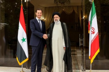 السيد رئيسي يلتقي الاسد في دمشق