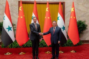 الرئيس الأسد خلال لقائه رئيس الوزراء الصيني لي تشيانغ